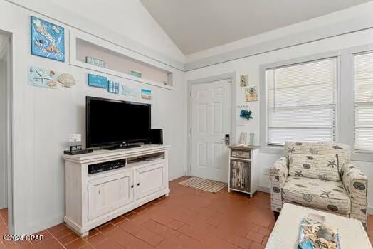 208 3rd St Unit 1/2, Panama City Beach, FL 32413 - living area with vaulted ceiling