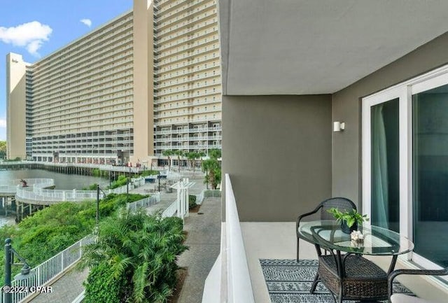 balcony featuring a water view