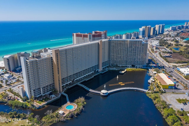 aerial view featuring a water view and a city view