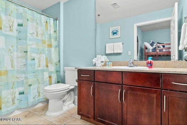 full bath featuring tile patterned flooring, visible vents, vanity, and toilet