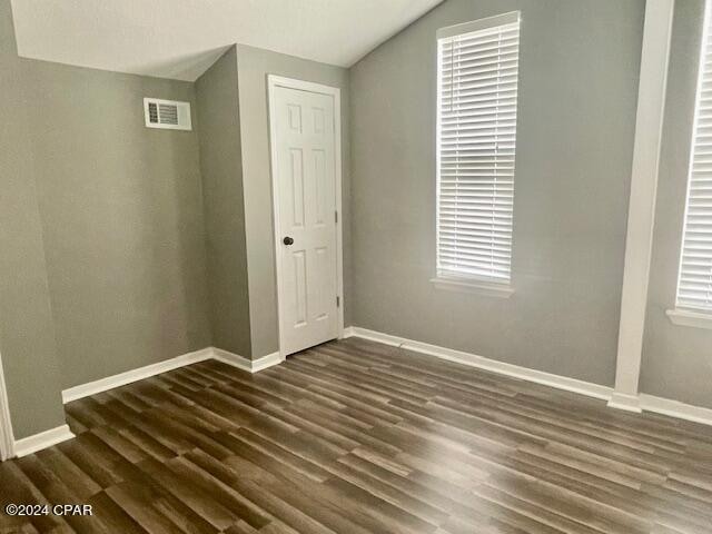 interior space featuring dark wood-type flooring