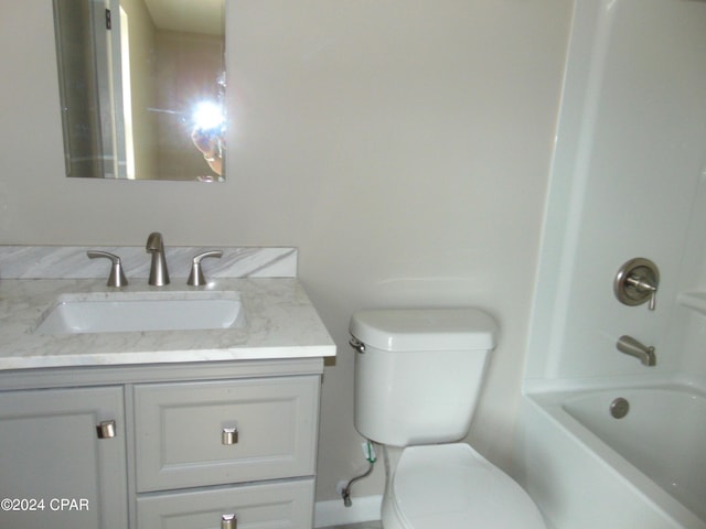 full bathroom featuring vanity, toilet, and shower / washtub combination