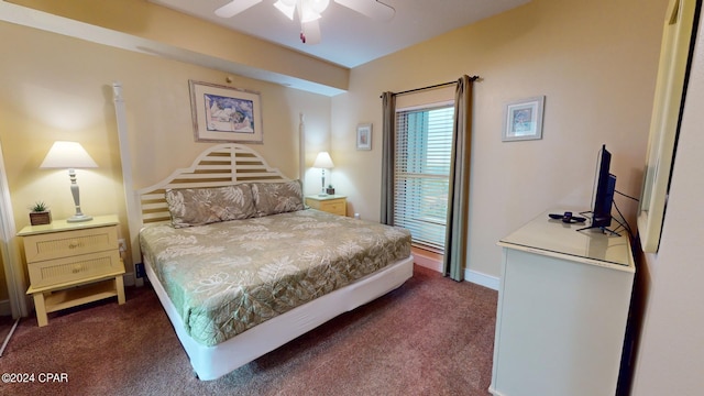 bedroom featuring ceiling fan and dark colored carpet