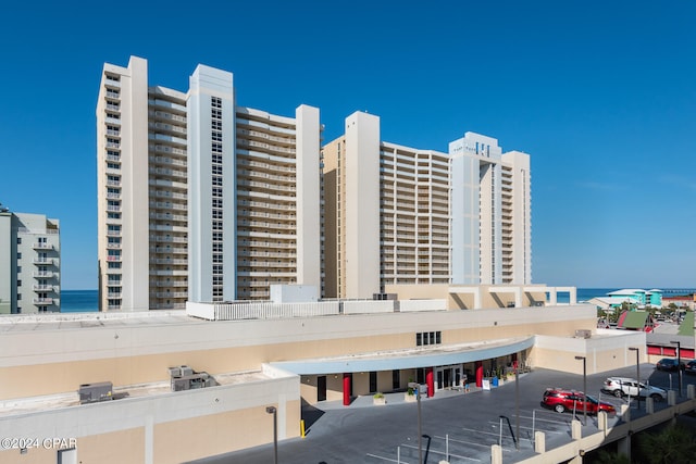 view of building exterior with a water view