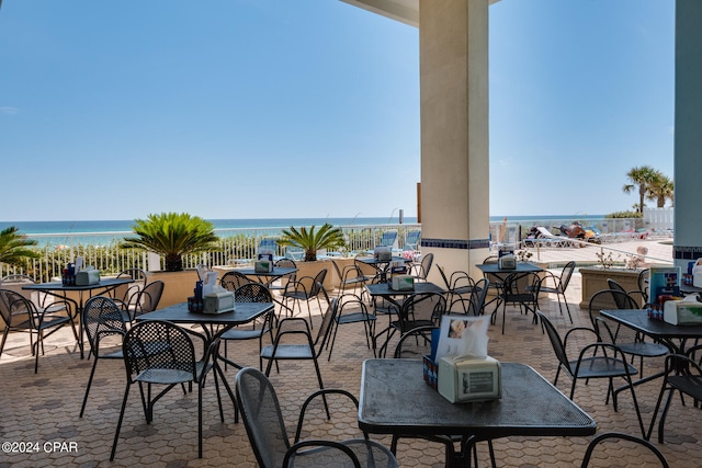 view of terrace featuring a water view