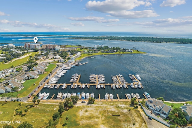 birds eye view of property featuring a water view