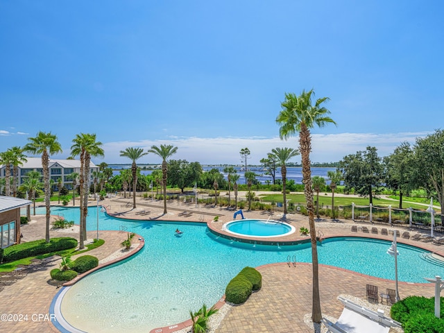 view of swimming pool featuring a patio area