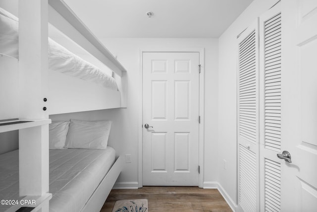 bedroom featuring wood-type flooring