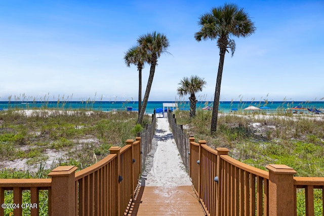 surrounding community featuring a water view