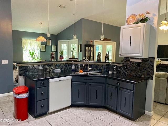 kitchen with dishwasher, french doors, light tile patterned flooring, and decorative backsplash