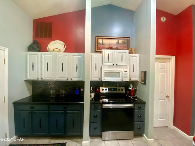 kitchen with stainless steel range with electric stovetop, white cabinets, light tile patterned floors, and decorative backsplash