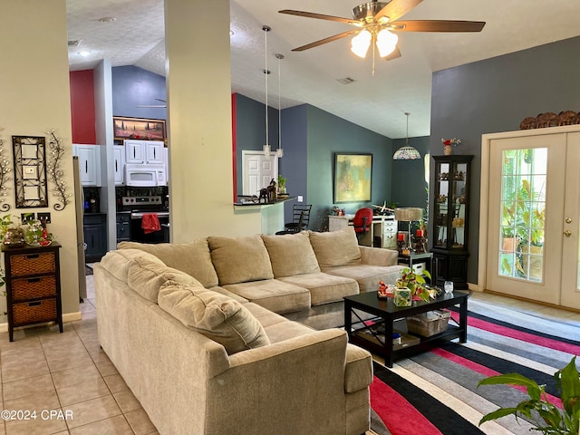 living room with ceiling fan, light tile patterned flooring, high vaulted ceiling, and french doors