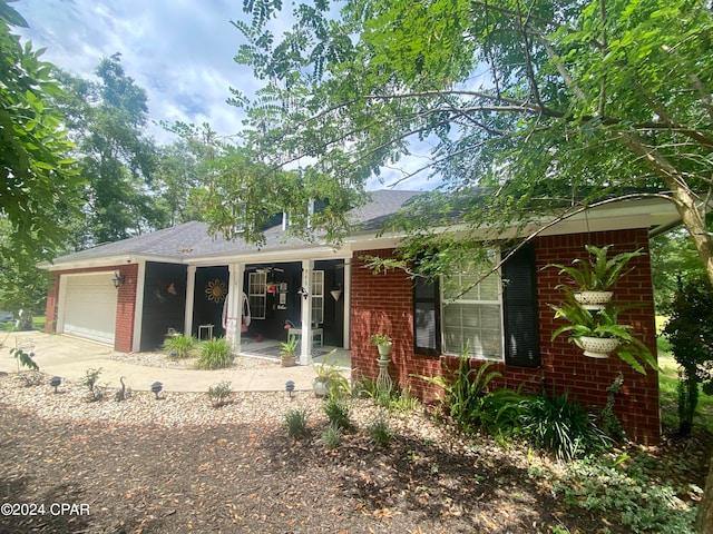 view of front of property featuring a garage