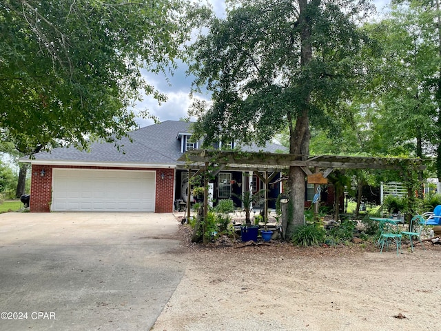 view of front of property featuring a garage