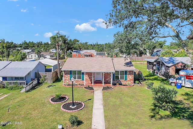 view of front of home with a front lawn