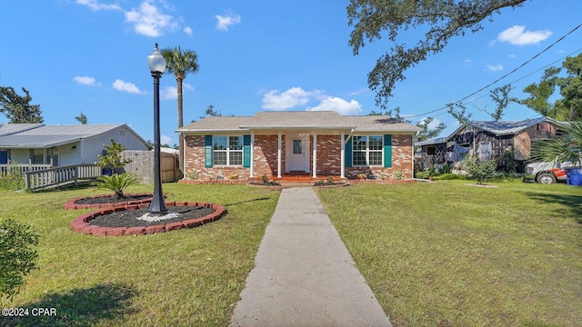 view of front facade with a front yard