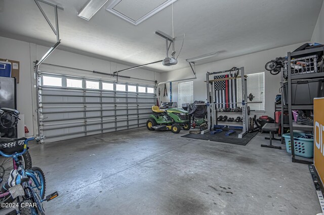 garage featuring a garage door opener