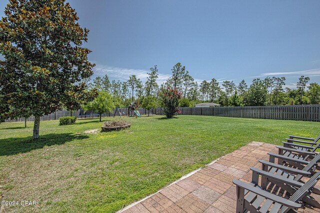 view of yard featuring a playground