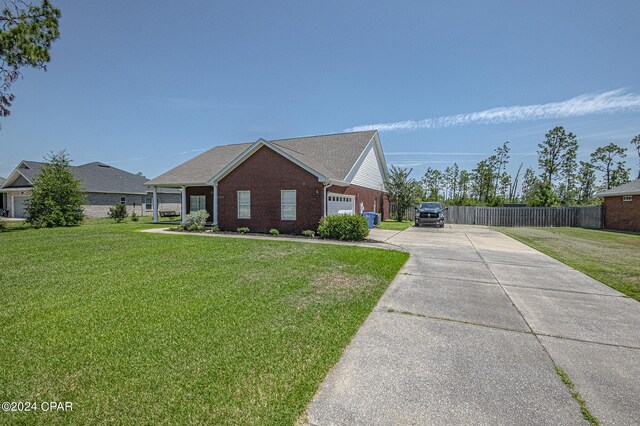 single story home with a front yard