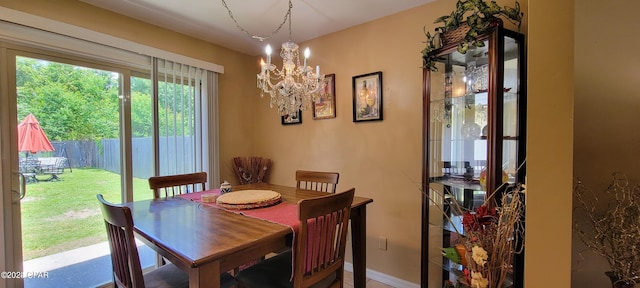 dining room with a notable chandelier