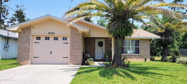 single story home with an attached garage, brick siding, concrete driveway, and a front yard