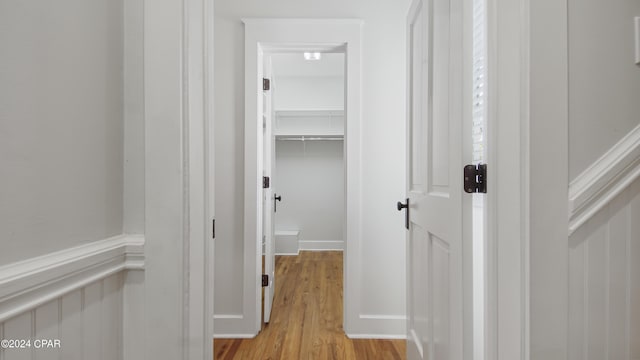 corridor featuring light hardwood / wood-style floors