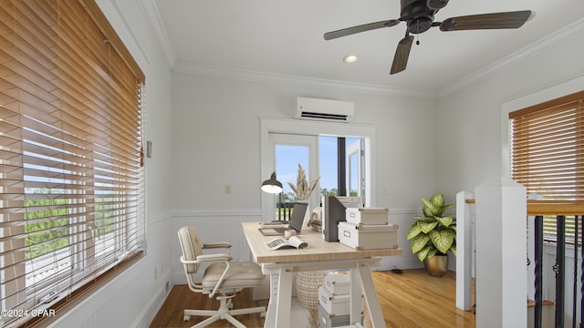 office area with ceiling fan, crown molding, light hardwood / wood-style floors, and an AC wall unit