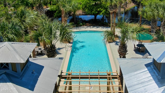 view of pool featuring a patio