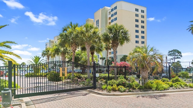 view of gate with fence