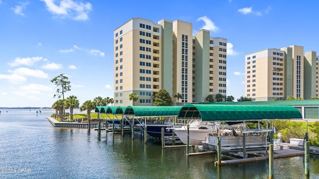 view of dock featuring a water view and boat lift