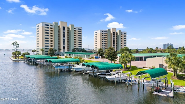 property view of water featuring a boat dock and boat lift