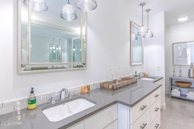 bathroom featuring vanity and tile patterned flooring