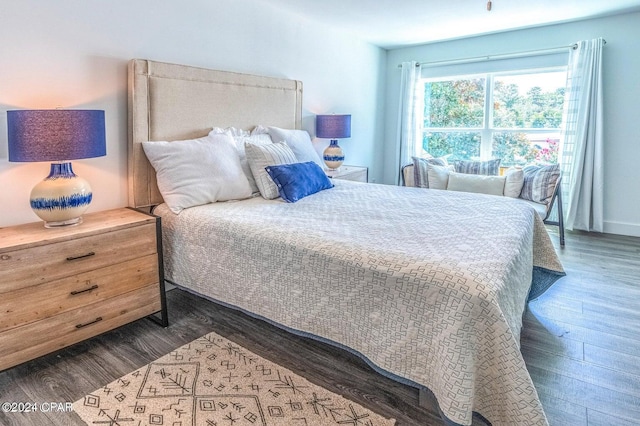 bedroom featuring dark hardwood / wood-style flooring