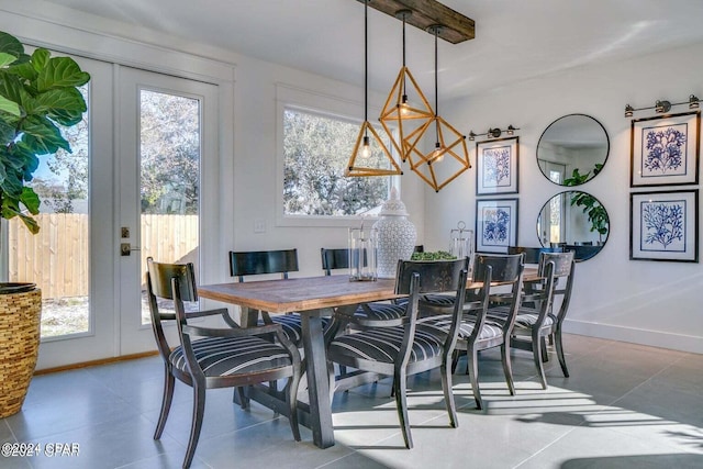 dining area featuring french doors