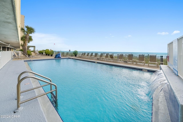 view of swimming pool featuring a patio