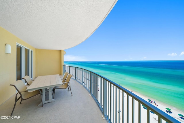 balcony featuring a water view