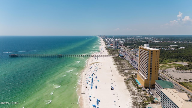 birds eye view of property with a water view, a city view, and a view of the beach