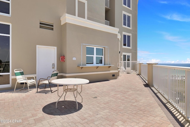 view of patio featuring fence