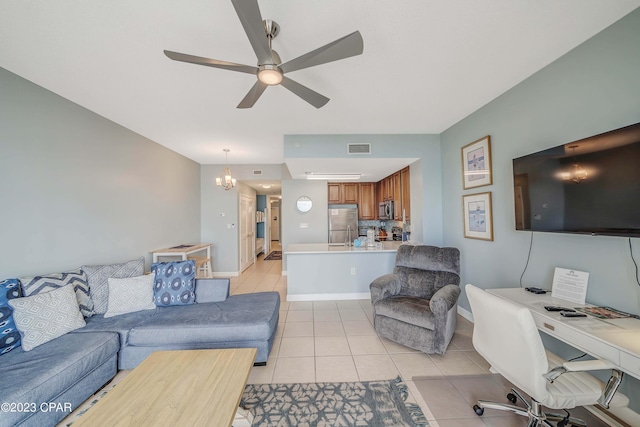 living room featuring light tile patterned flooring and ceiling fan