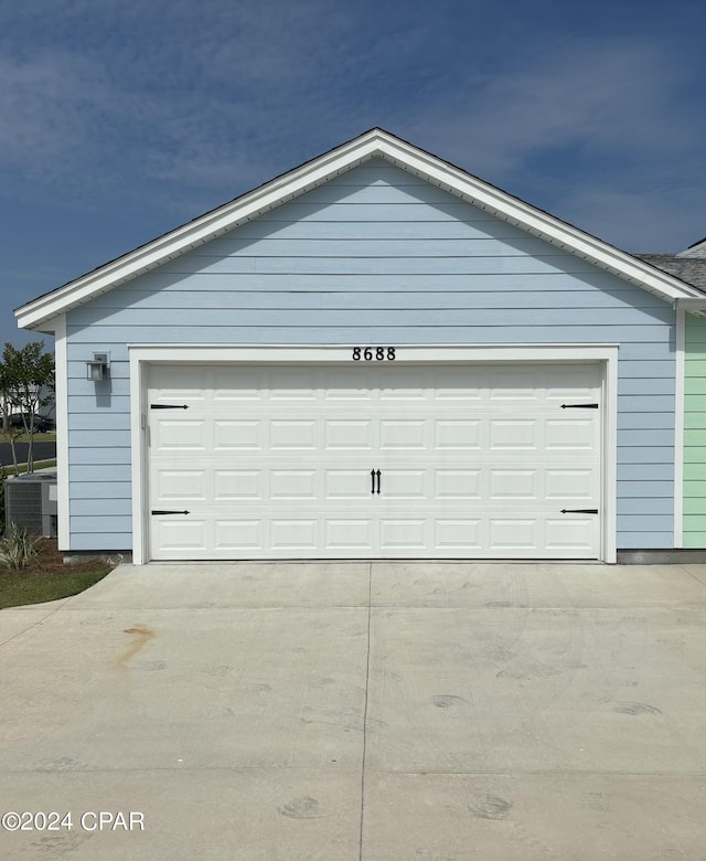 garage with central AC unit