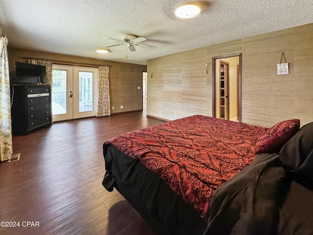 bedroom with french doors, dark hardwood / wood-style floors, ceiling fan, access to exterior, and a textured ceiling