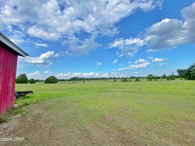 view of yard featuring a rural view