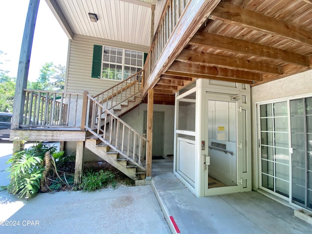 doorway to property with a patio