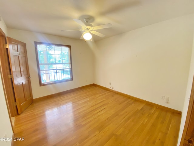 unfurnished bedroom with ceiling fan and light hardwood / wood-style floors