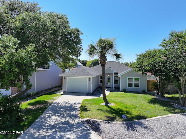 rear view of house with a yard, central AC, and a patio area