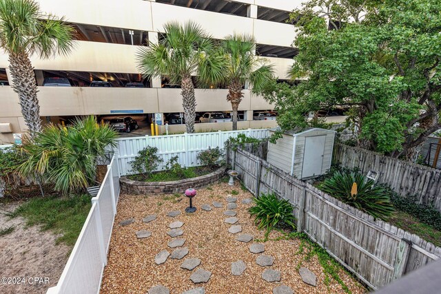 view of yard featuring a storage unit