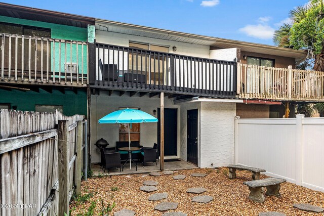 back of property with a patio area