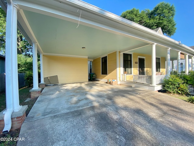 view of front of home featuring a carport