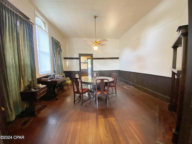 dining area with plenty of natural light, wood-type flooring, and ceiling fan