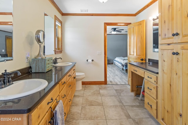 bathroom featuring toilet, ornamental molding, ceiling fan, and tile floors